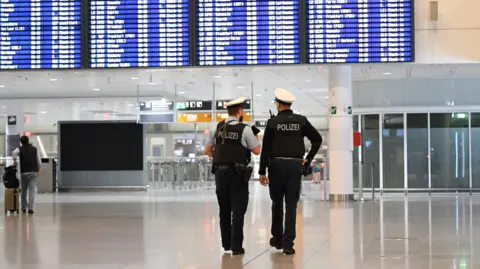 Flights Resume at Munich Airport Following Drone Scare: Increased Security Measures Discussed