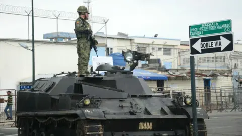 Tragic Prison Clashes in Ecuador Leave 14 Dead, Including Guard