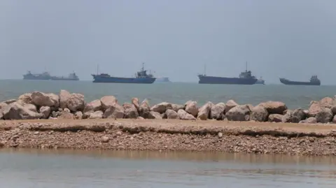 US lifts naval blockade as Iran’s supreme leader says Trump made deal ‘out of desperation’