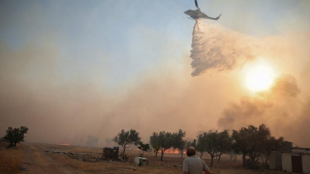 Greek Wildfire Rescue Tragedy: Two Helicopters Collide Over Psatha