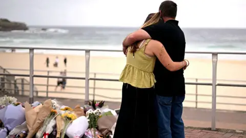 Surviving Suspect Charged with Multiple Counts of Murder in Sydney's Bondi Beach Shooting