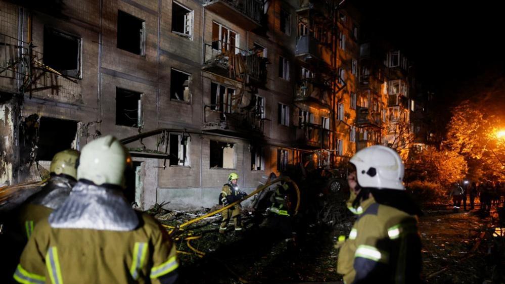 Russian missile strikes on Kyiv kill at least nine, Ukraine officials report