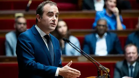 French PM Secures Temporary Respite Amid Legislative Turmoil