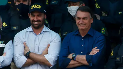 Eduardo Bolsonaro Faces Coercion Charges Amid Father's Legal Troubles