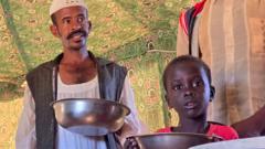 Man in white robe holding a bowl in Sudan