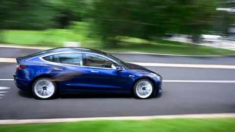 Investigation Launched into Tesla's Self-Driving Cars After Traffic Law Violations