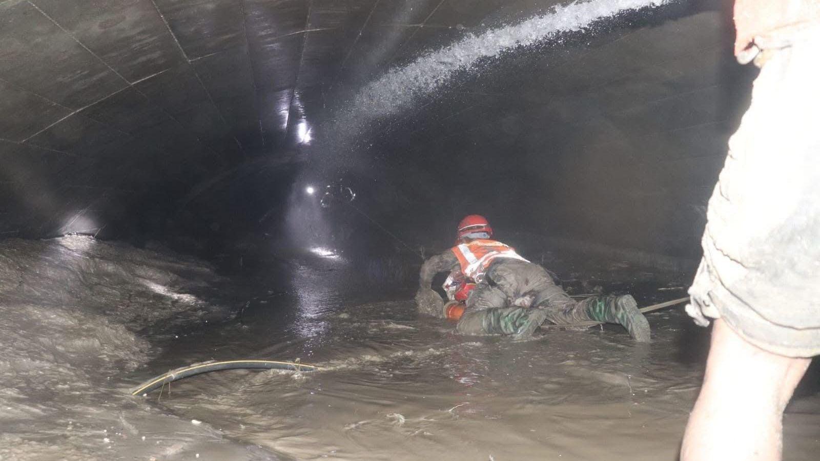 Rescuers race to free workers trapped in Nepal hydropower tunnels after deadly flood