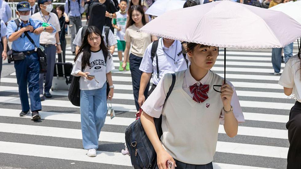 Japanese school girl with umbrella