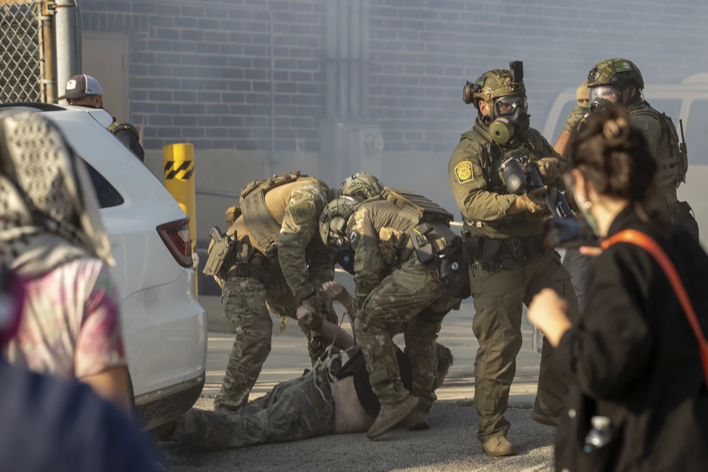 Protesters Clash with Authorities Outside Chicago Immigration Building