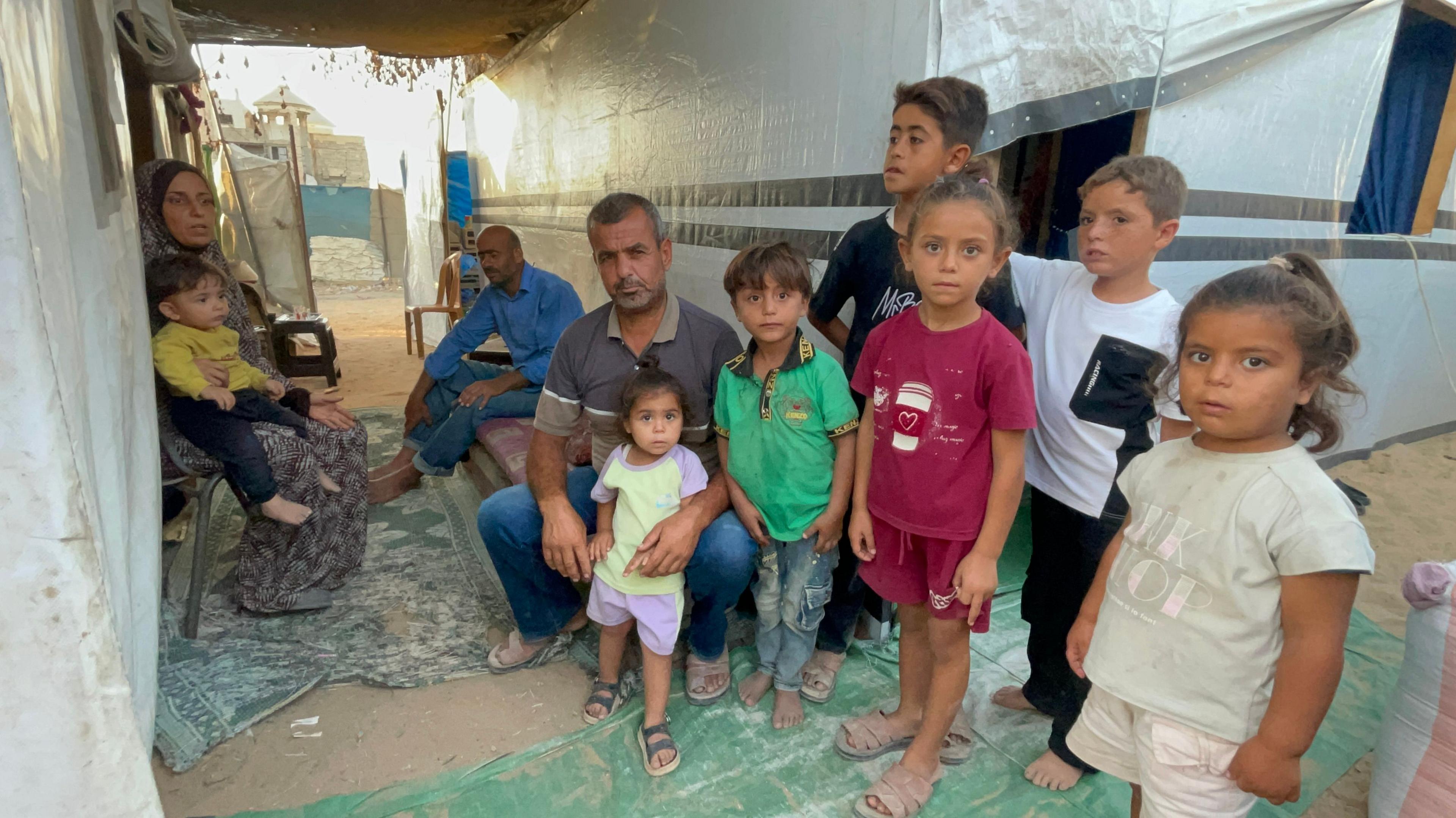 Dalal al‑Dahdouh with her family in Gaza City