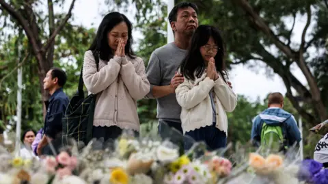 Tragedy in Hong Kong: Fire Claims 146 Lives as Nation Mourns