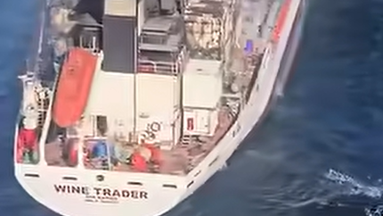 Search and rescue helicopter above the tanker Wine Trader