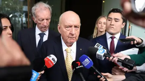 Alan Jones Faces Downgraded Sex Abuse Charges